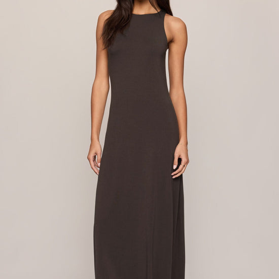 Women’s charcoal brown sleeveless jersey maxi dress with high neck and A-line skirt, available at Ekam boutique Newport Beach