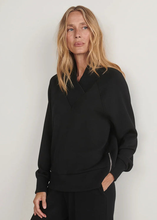 woman wearing black sweatshirt 