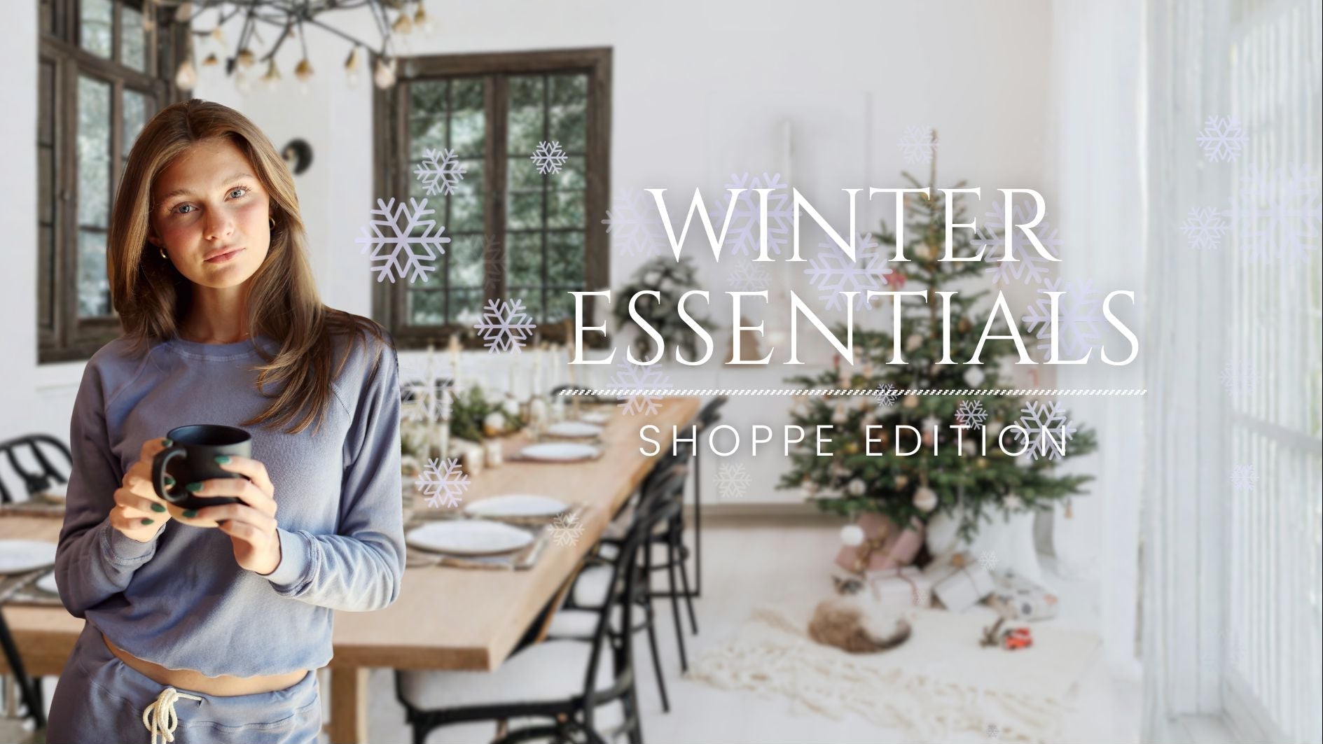 Woman holding a mug in a dining room with text 'Winter Essentials Shoppe Edition'.