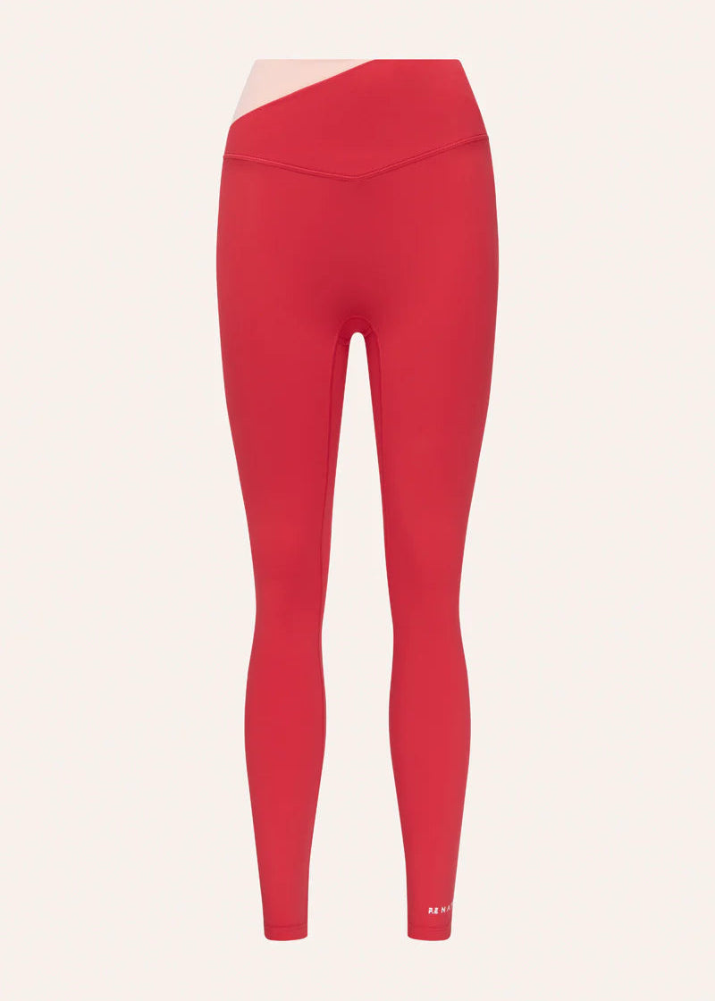 Red leggings on a light pink background