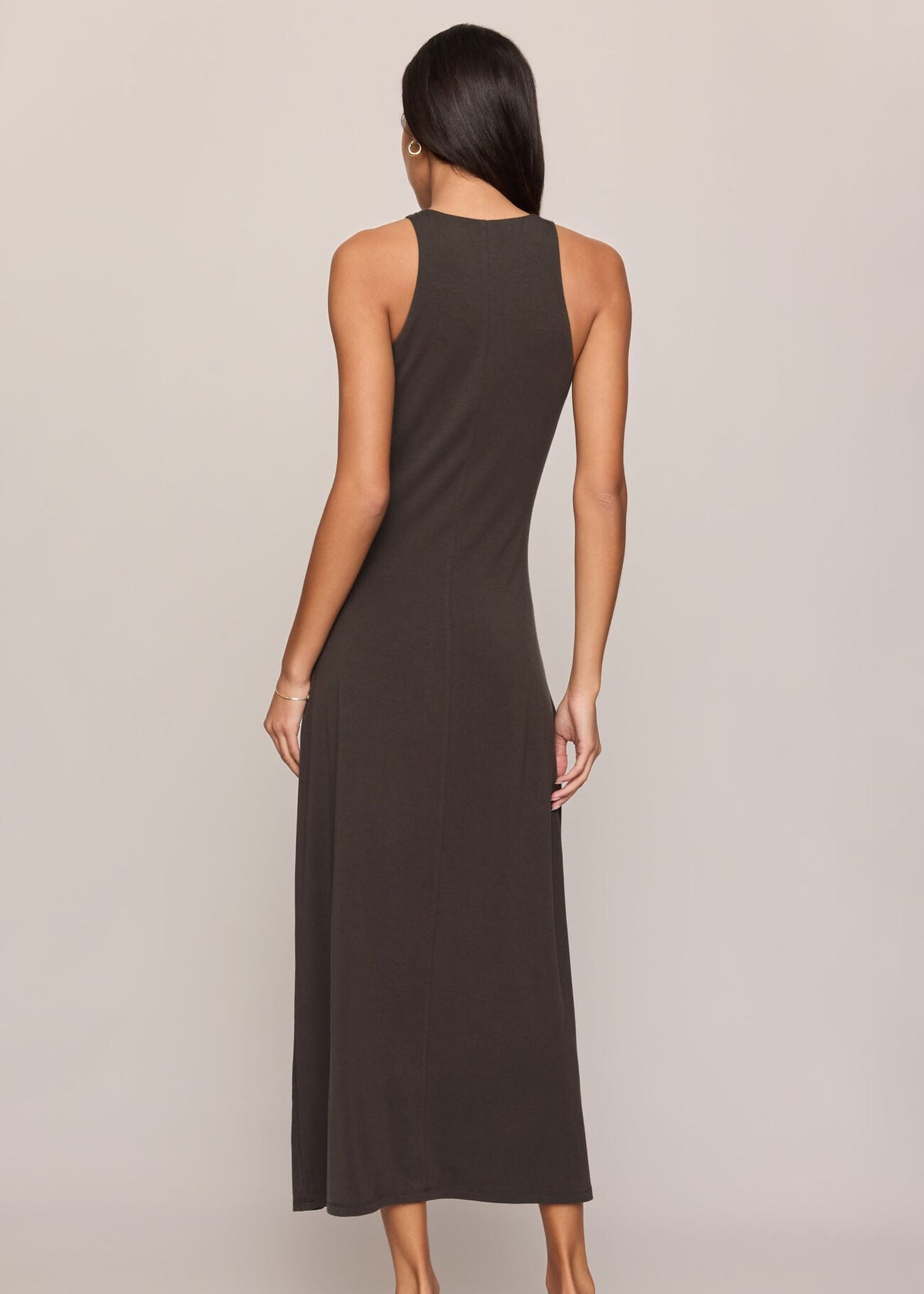 Women’s charcoal brown sleeveless jersey maxi dress with high neck and A-line skirt, available at Ekam boutique Newport Beach